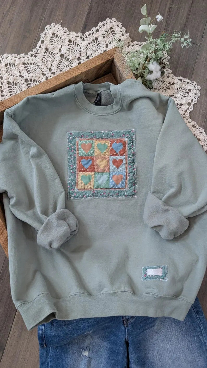 9 Patch Hearts Vintage Print on Sage Crewneck