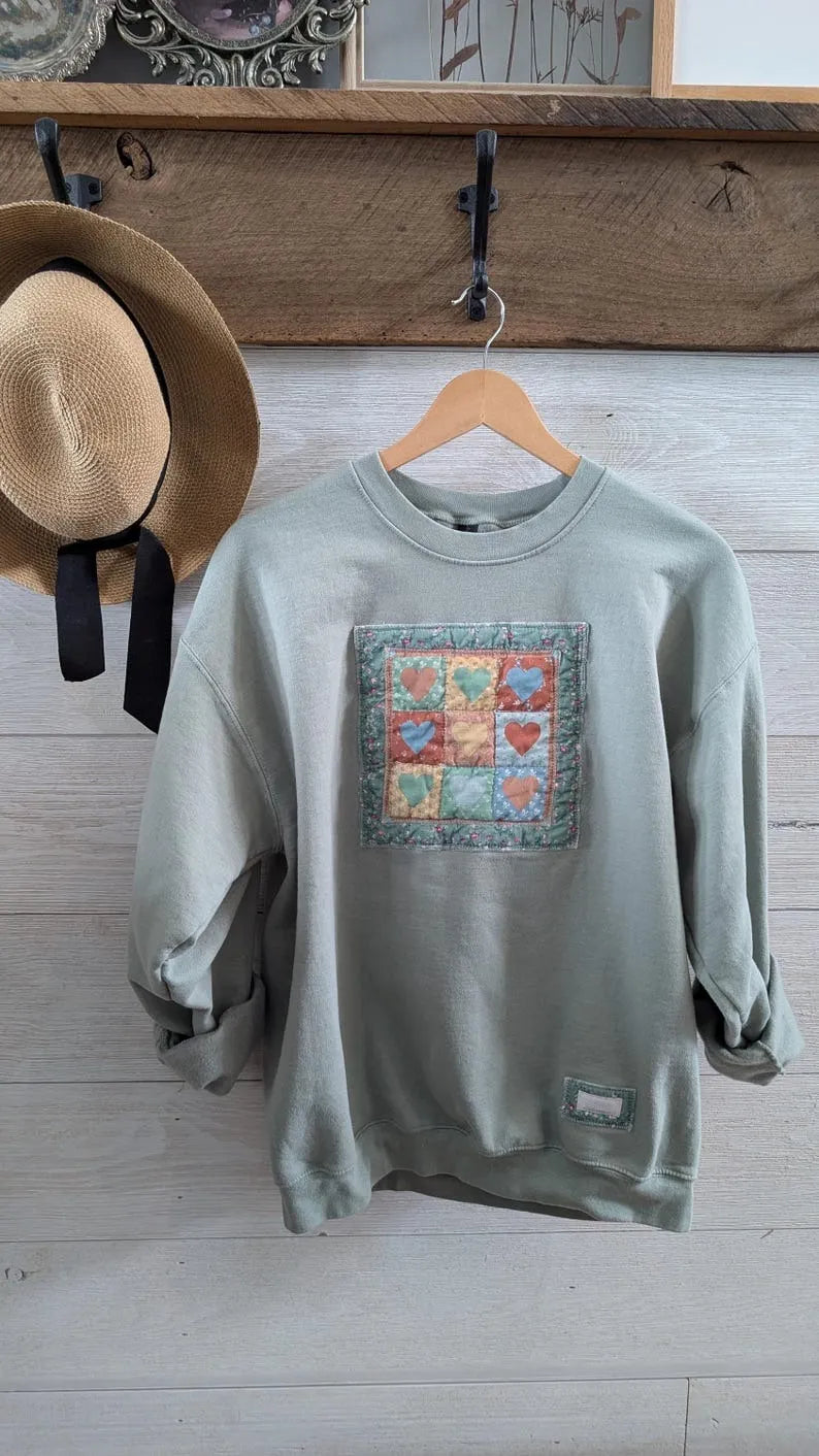 9 Patch Hearts Vintage Print on Sage Crewneck